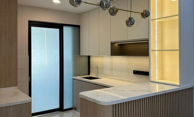Dahlia kitchen in Rawang with grey and wood cabinetry, counters and glazed display storage