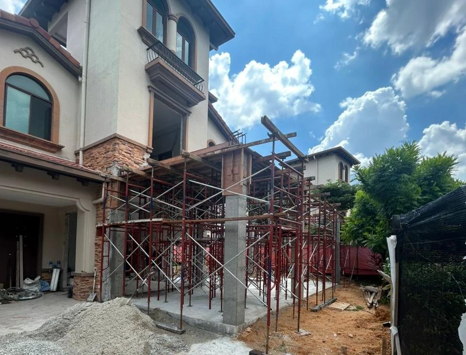 Scaffolding and construction work alongside the existing Diamond Residence house in Semenyih