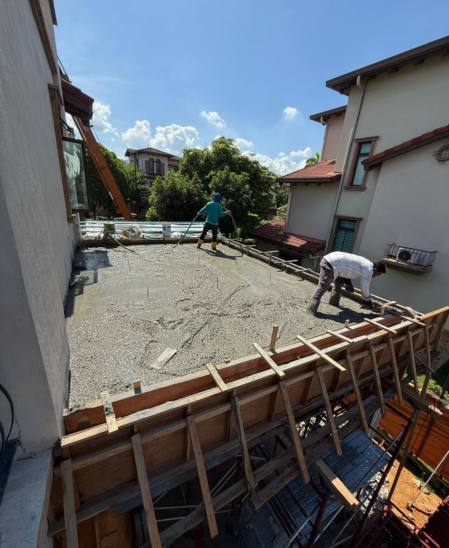 Concrete slab and ground-level construction at Diamond Residence